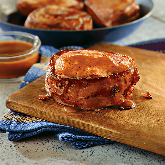 Bacon-Wrapped BBQ Pork Chops in packaging