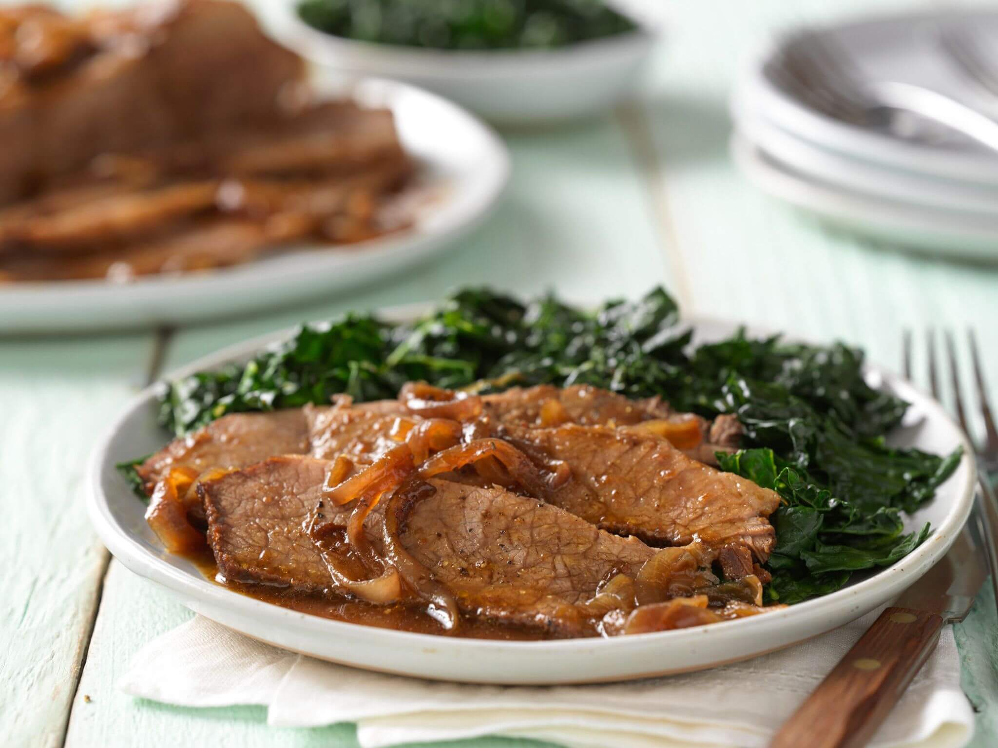 Pomegranate-Braised Beef Brisket with Caramelized Onions